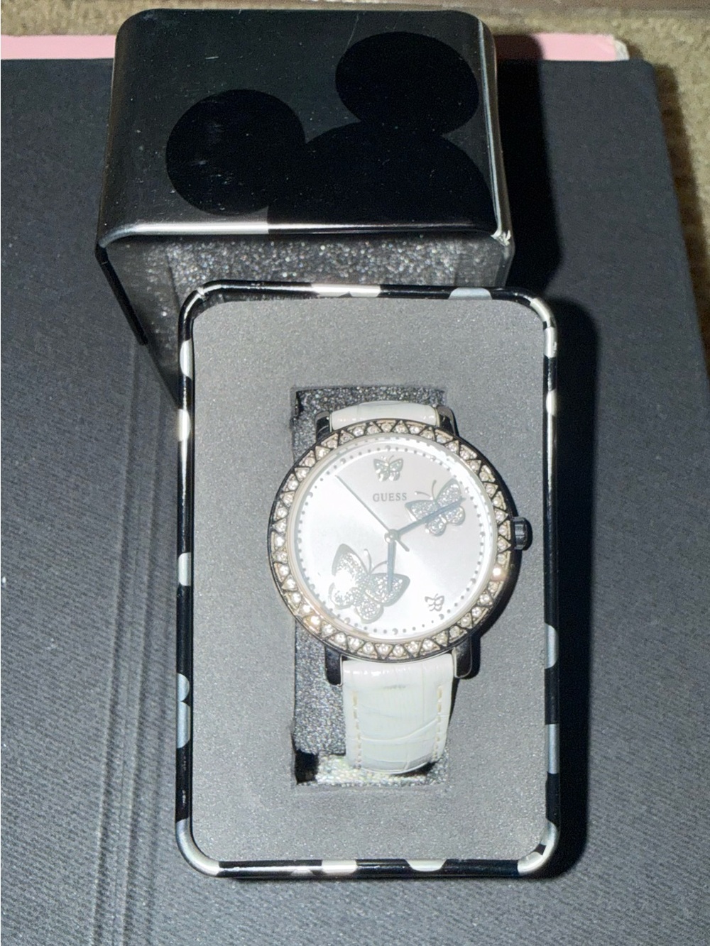 GUESS Silver-Tone Watch with White Strap and Butterfly Accents